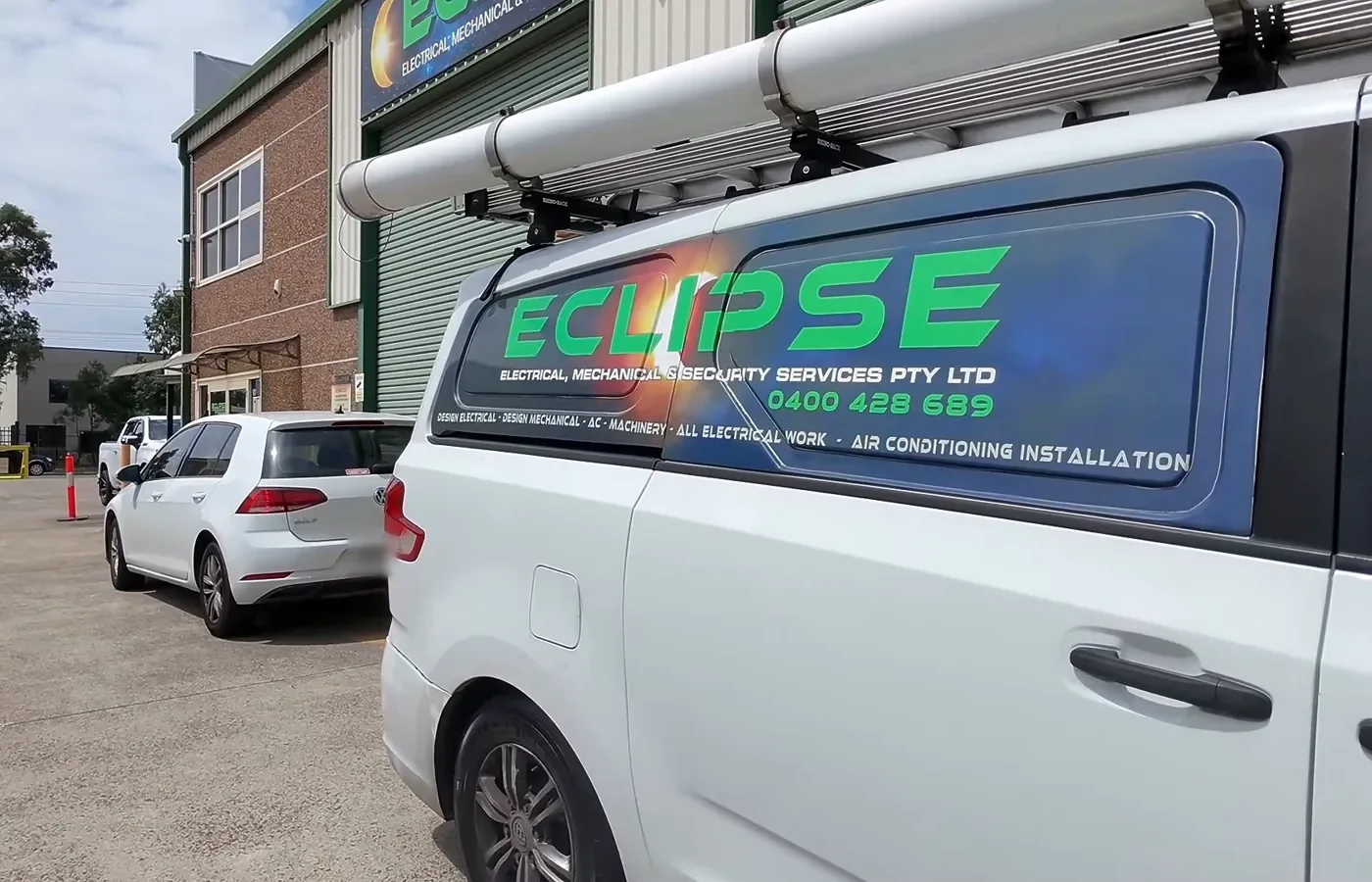 Eclipse signwritten service van outside the Minchinbury workshop
