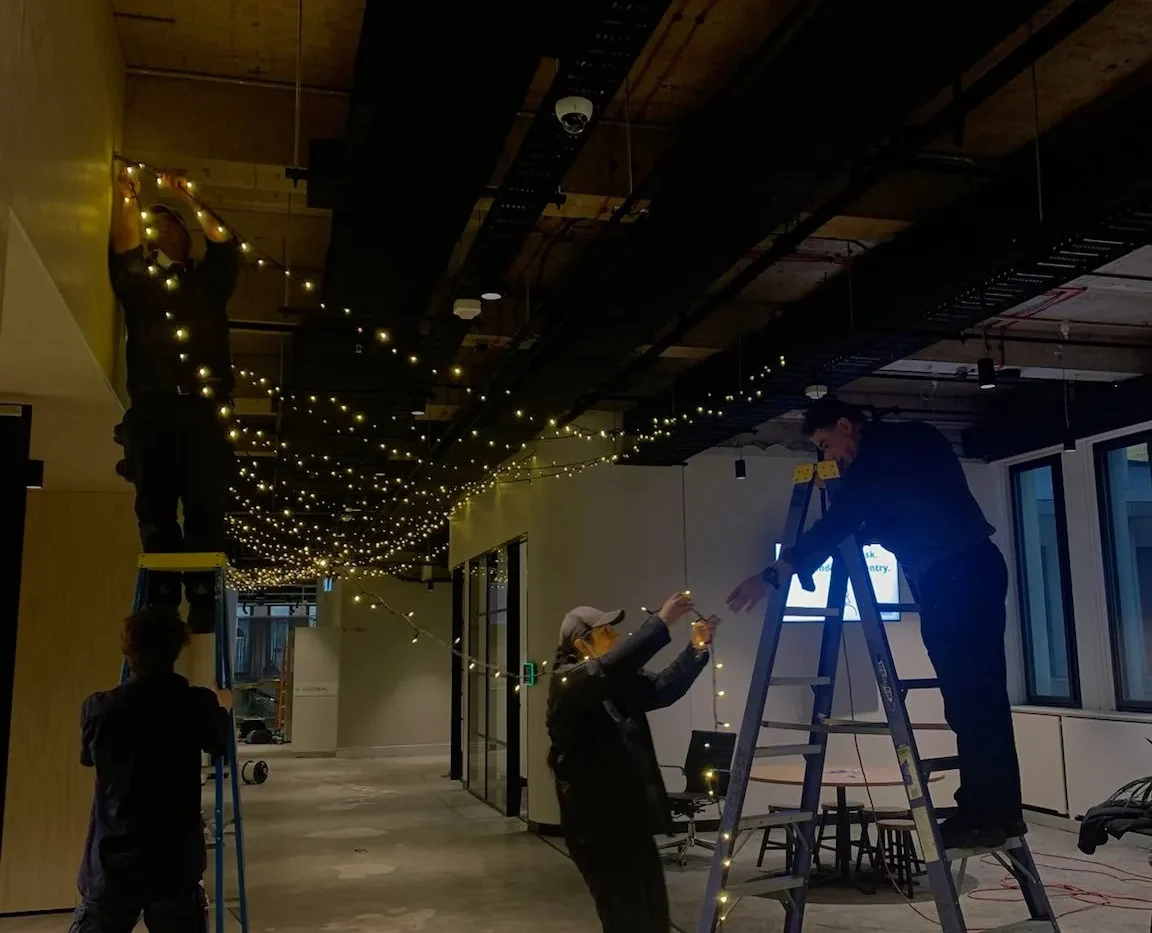 Eclipse electricians installing lighting in a commercial fit-out