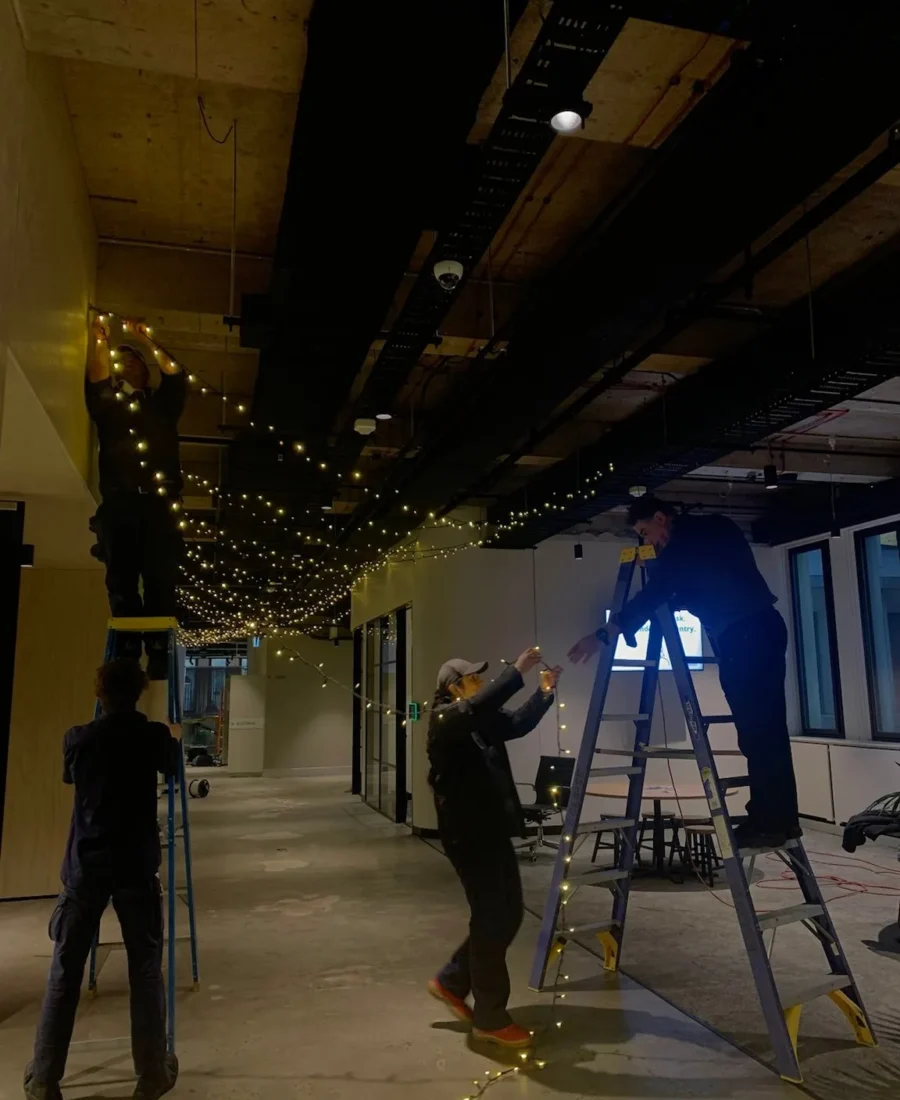 Eclipse electricians installing lighting in a commercial fit-out