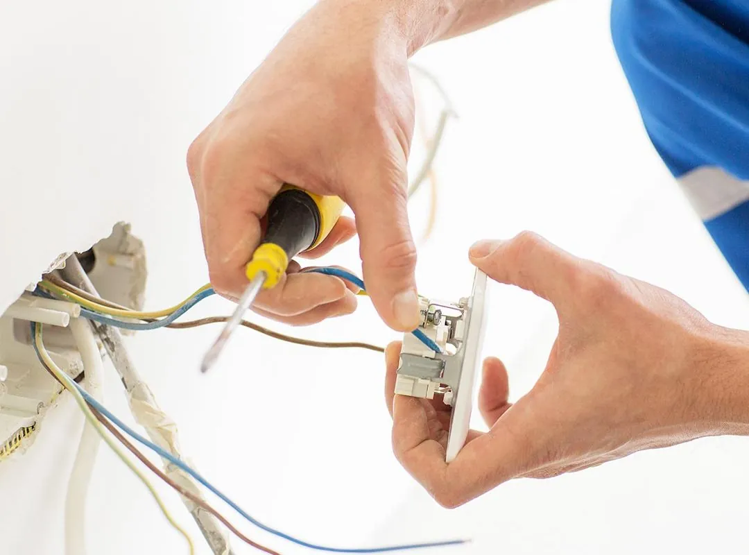 Electrician wiring a new power point